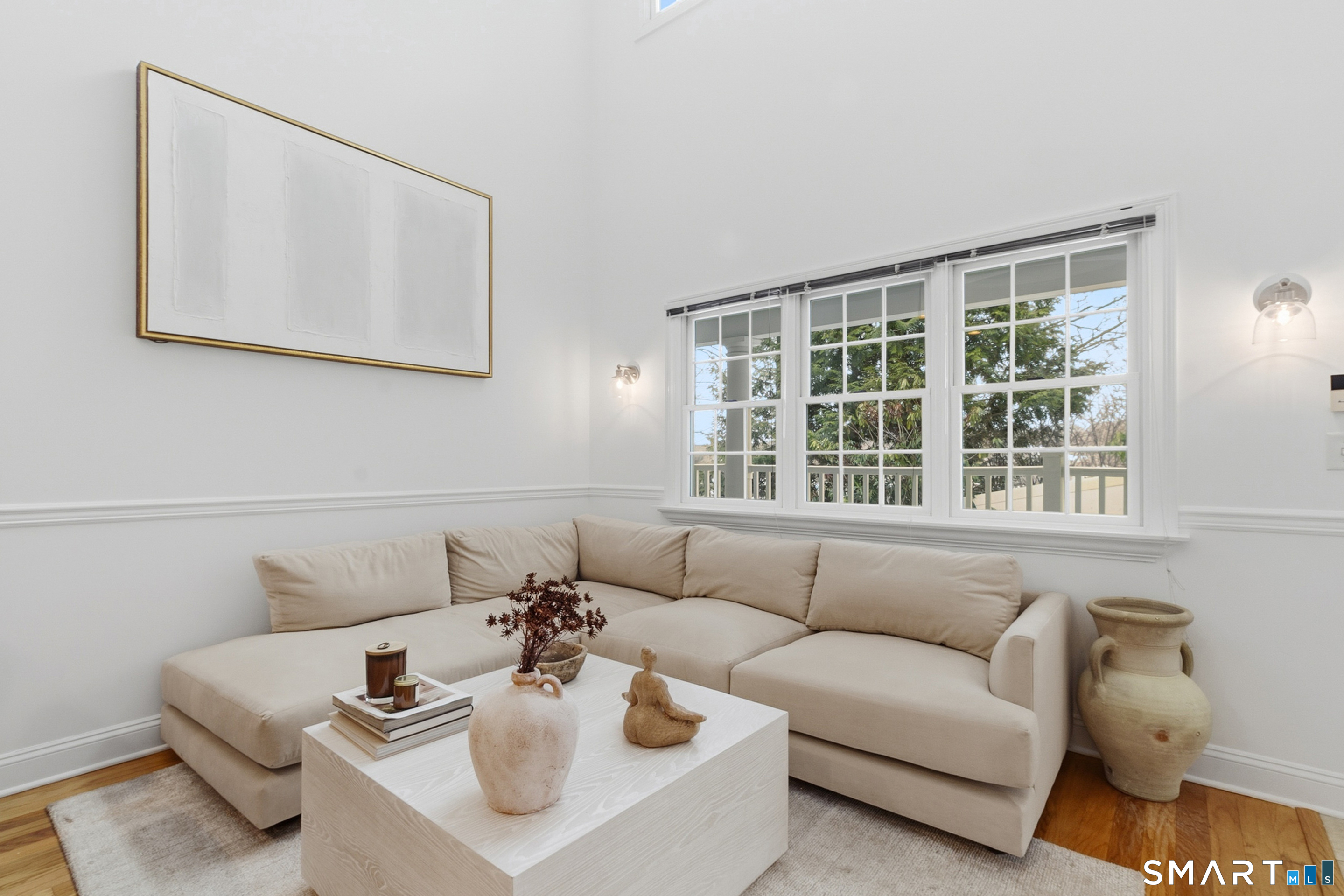 20 Cross Street, Unit 3 Westport, CT 06880 - Photo 3 of 20 a living room with furniture and a window