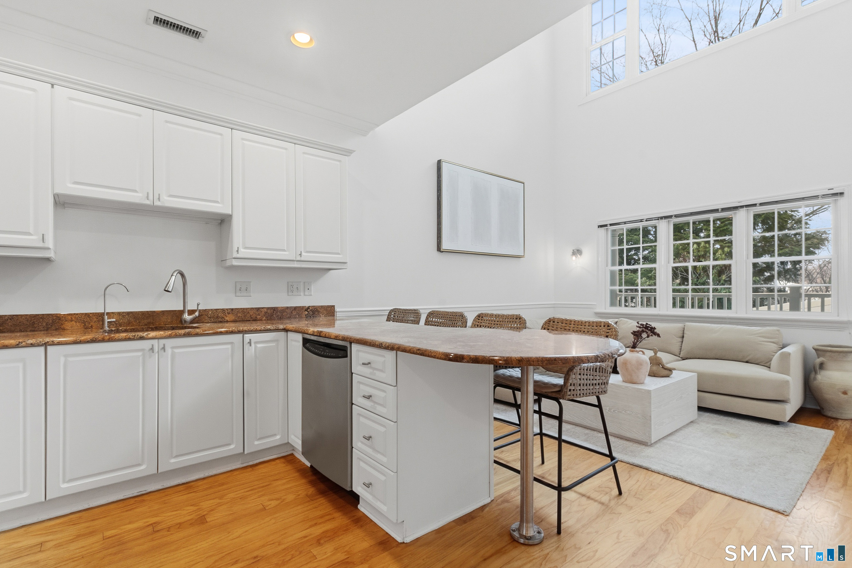 20 Cross Street, Unit 3 Westport, CT 06880 - Photo 5 of 20 a kitchen with a sink cabinets and window