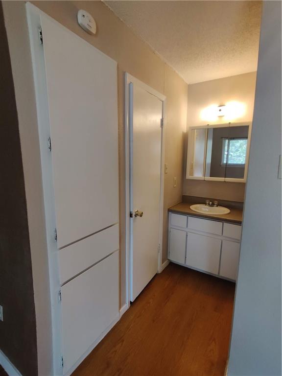 400 West 34th Street, Unit 201 Austin, TX 78705 - Photo 4 of 7 a view of a bathroom with mirror