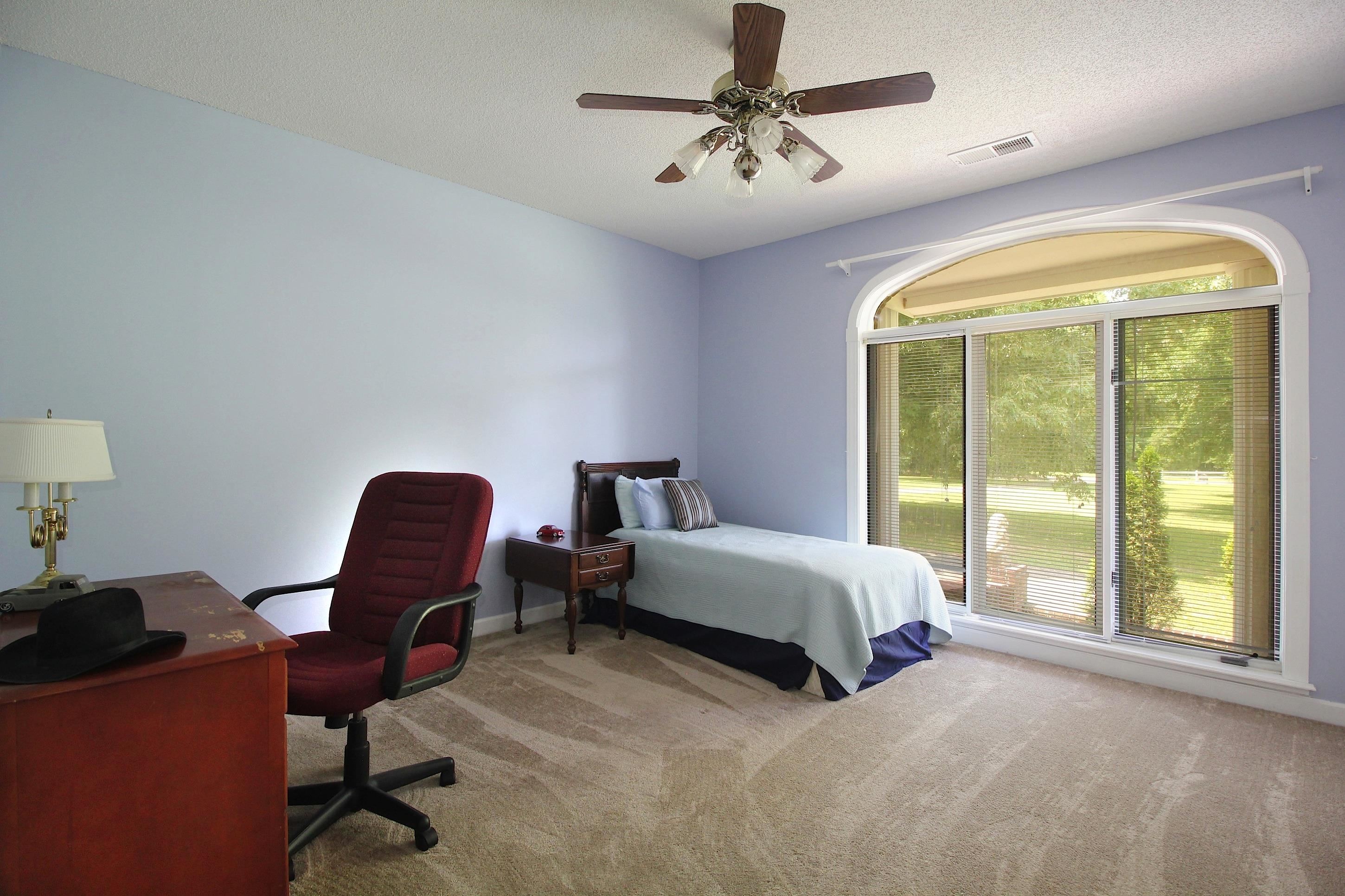 2550 North Reid Hooker Road Eads, TN 38028 - Photo 20 of 32 a living room with furniture and a window