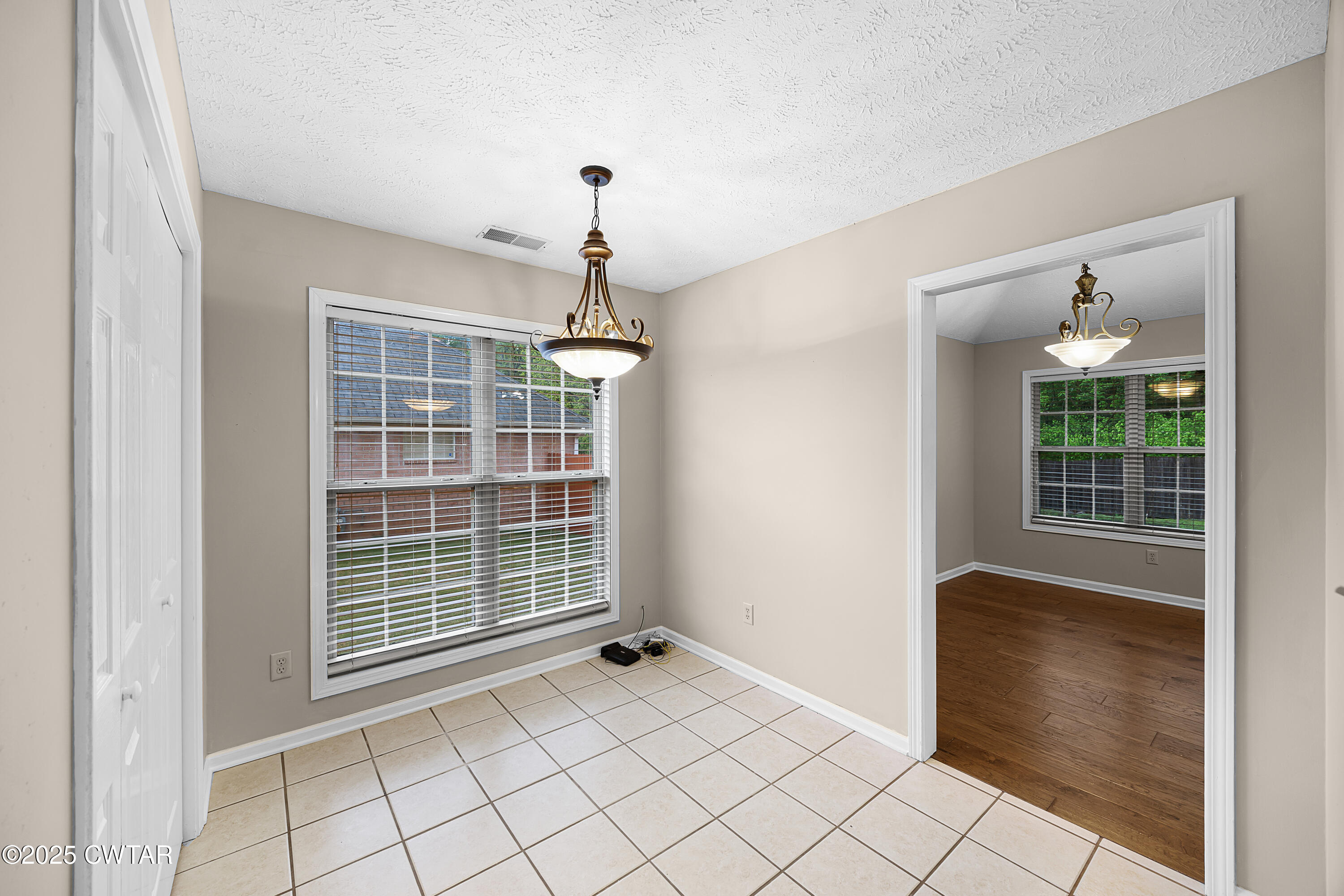 98 Cotton Ridge Drive Jackson, TN 38305 - Photo 9 of 20 a view of an empty room with a window