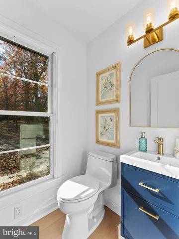 a spacious bedroom with a bed and furniture