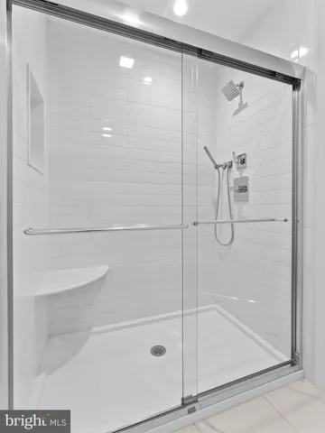 a bathroom with a sink double vanity and a mirror