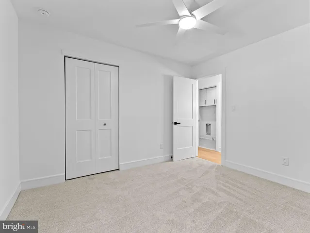 a view of a room with wooden walls
