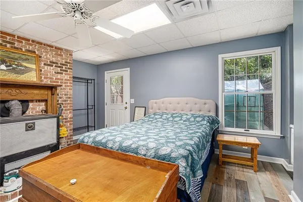 a bed room with a bed and a television