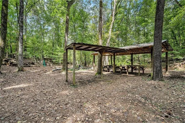 a view of a house with backyard from a patio