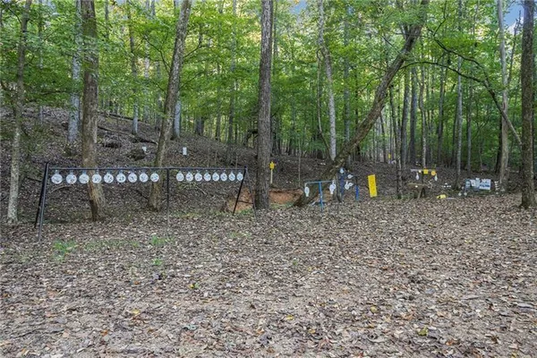 a view of outdoor space with sink and trees
