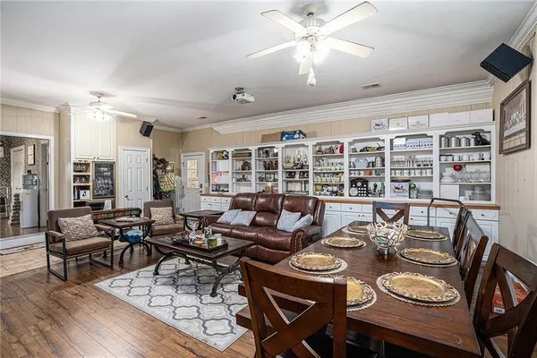 a view of a dining room with furniture window and outside view