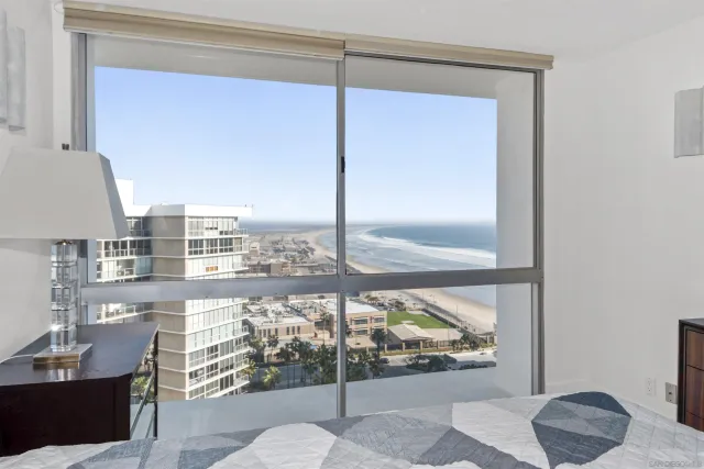 a view of a glass door with a balcony
