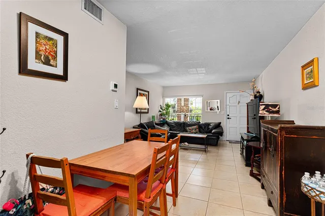 a kitchen with stainless steel appliances granite countertop a stove and a microwave