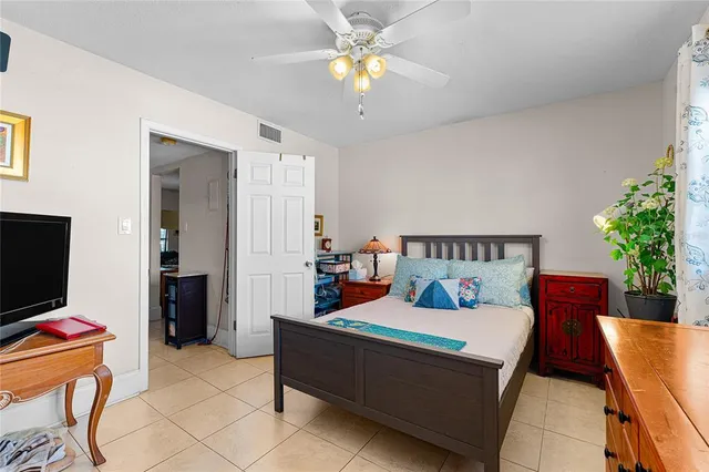 a bathroom with a sink mirror and toilet