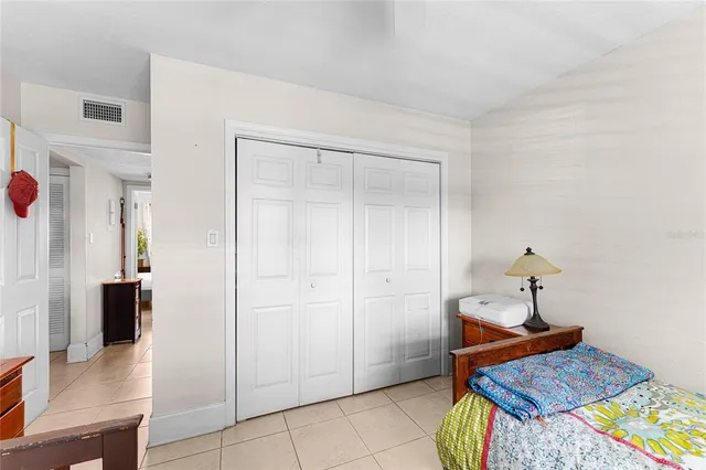 a view of a hallway with paintings on the wall