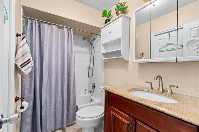 a balcony with view of car parked