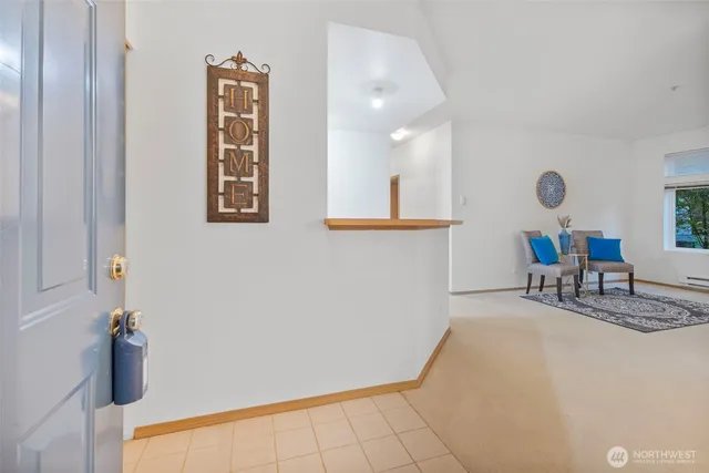 a view of a room with furniture and bicycles