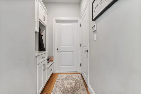 a view of hallway with walk in closet
