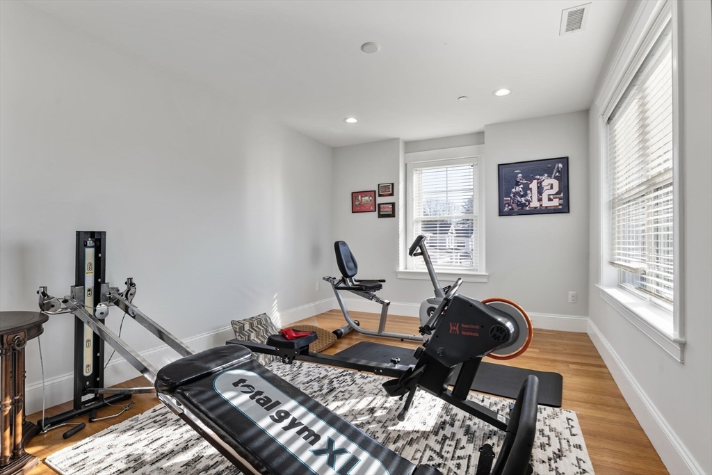15 Rowell Lane, Unit 15 Middleton, MA 01949 - Photo 29 of 39 a living room with couch and a window