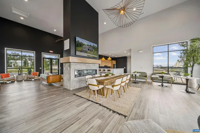 a dining room with furniture and a fireplace