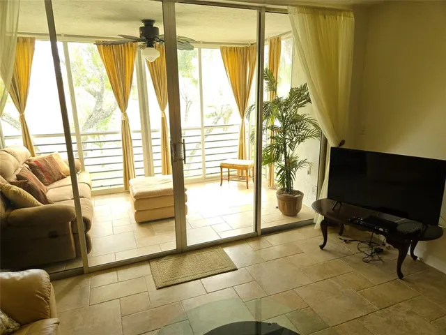 a bedroom with a bed and a lamp on table