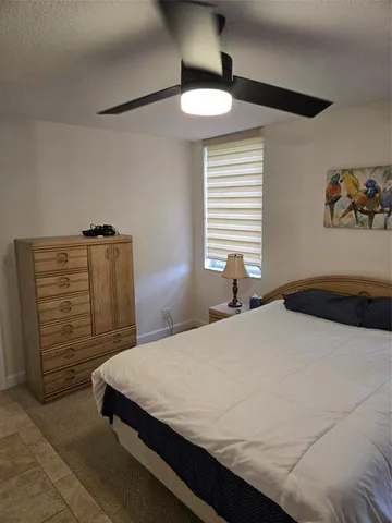 a room with furniture and a flat screen tv