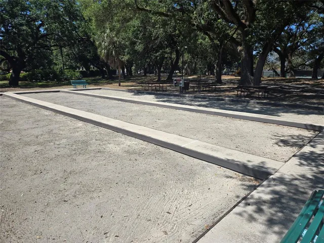 a view of residential houses with outdoor space and lake view