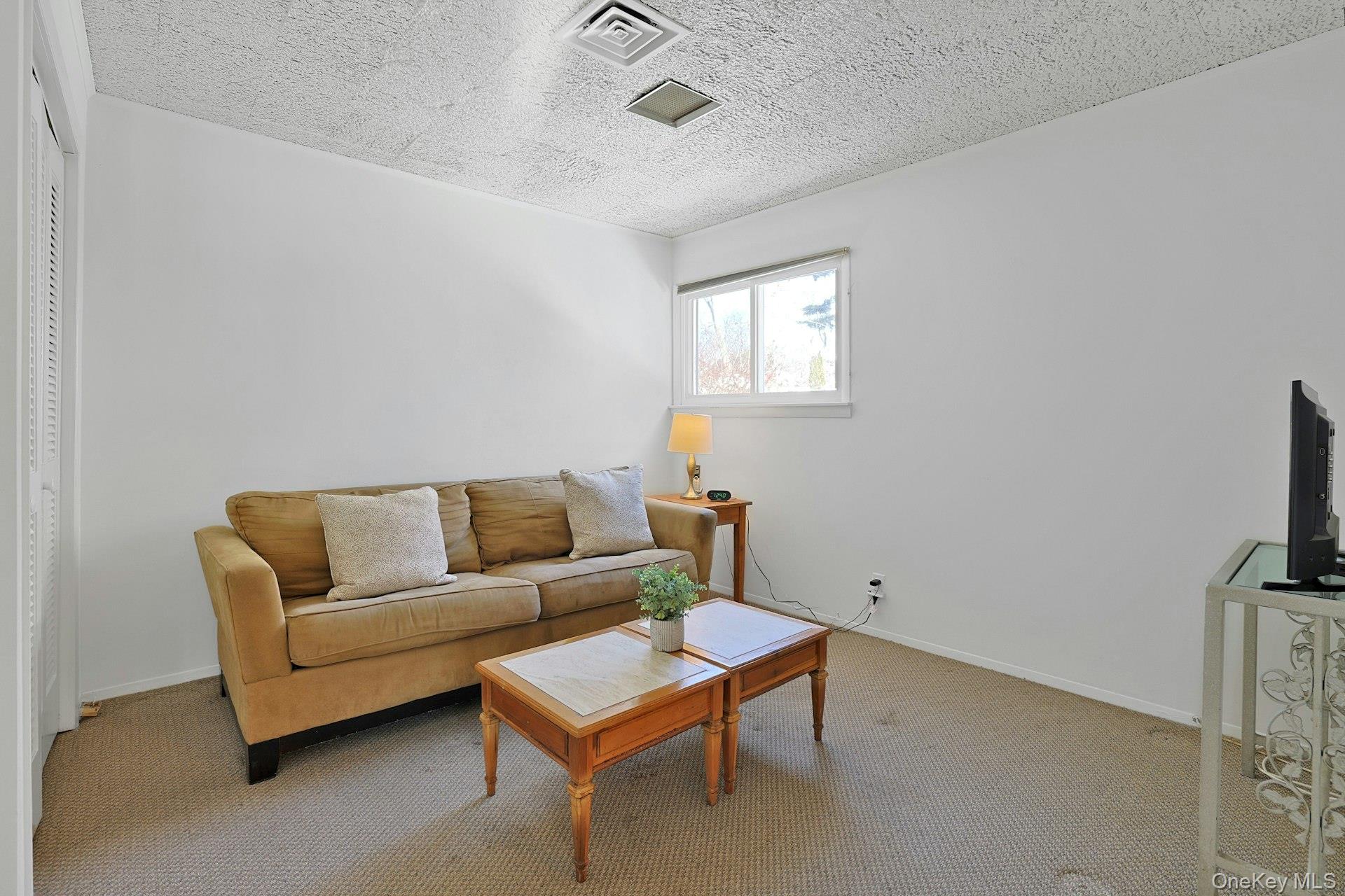 32 Lambert Lane New Rochelle, NY 10804 - Photo 13 of 27 First floor bedroom or den with bath