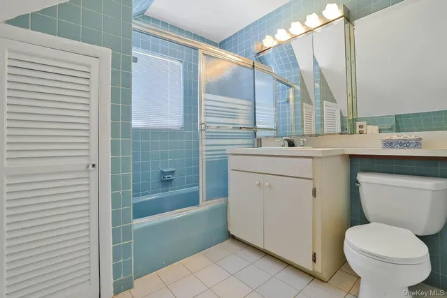 a view of a patio with table and chairs potted plants and a large tree