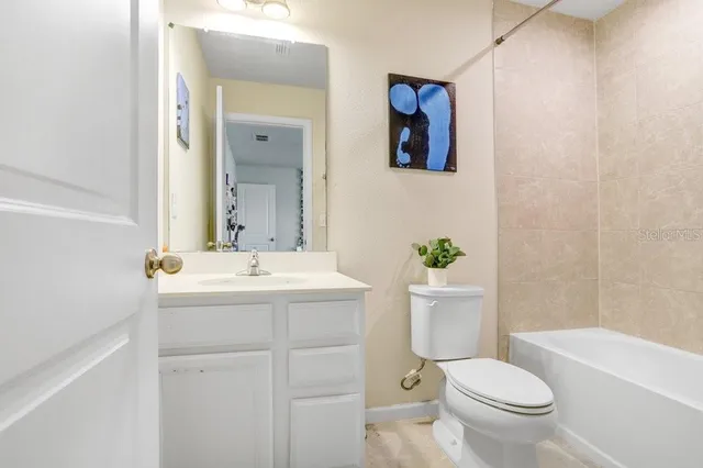 a view of house with yard and entertaining space