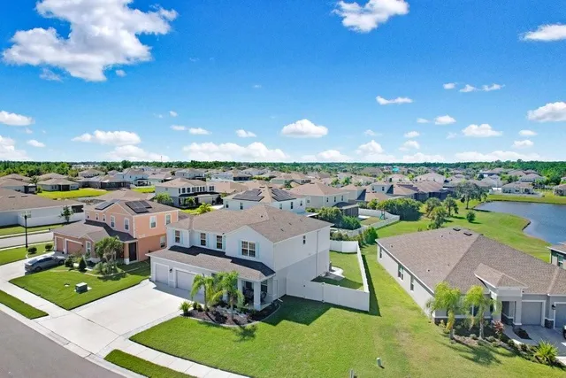 a view of a city with lawn chairs