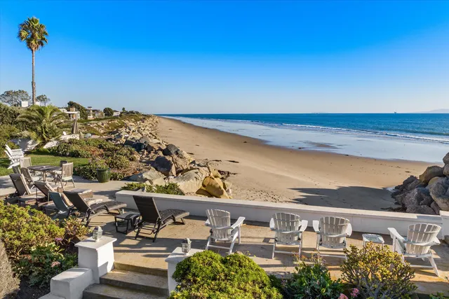 a view of roof with potted plants and sky view