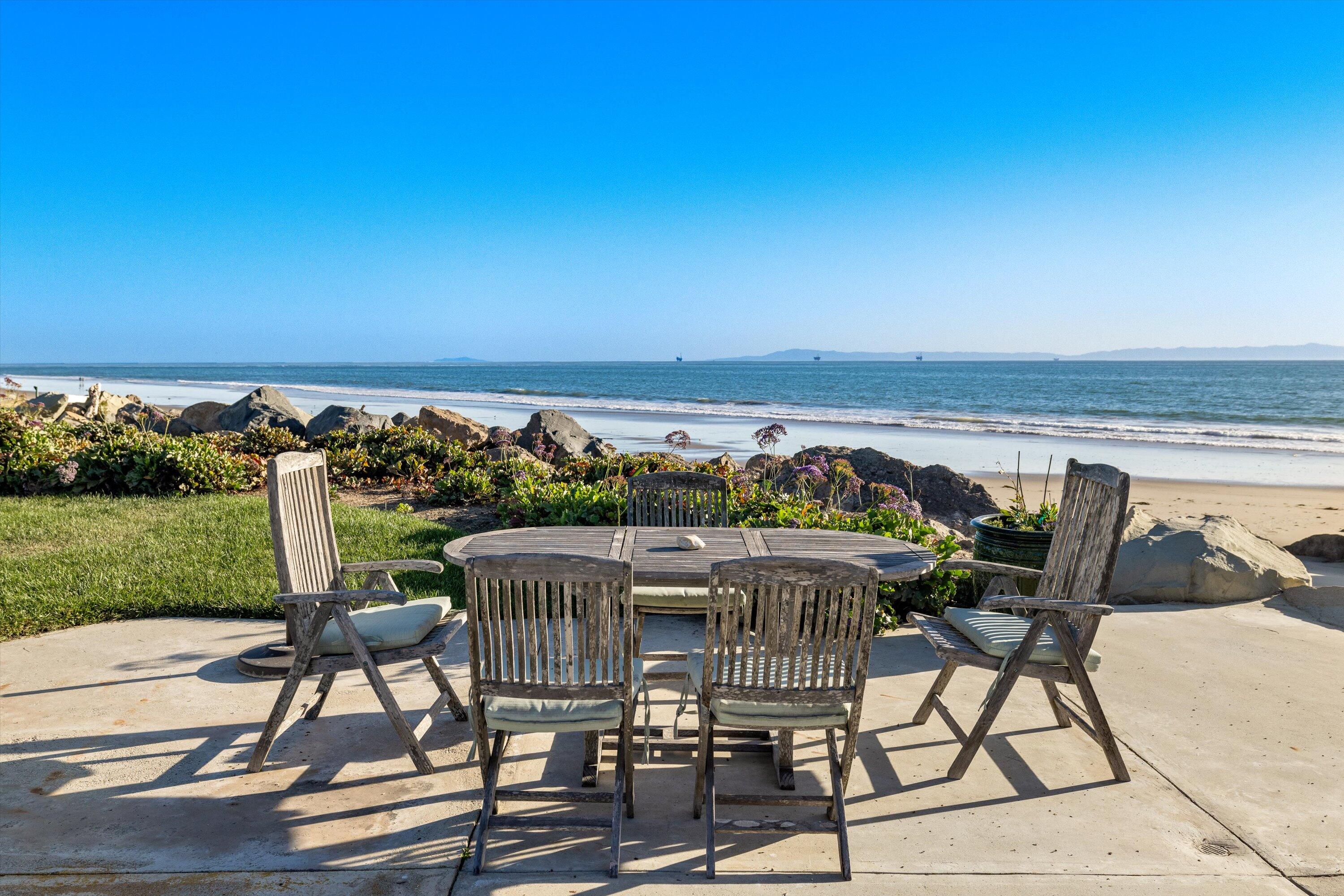 867 Sand Point Road Carpinteria, CA 93013 - Photo 17 of 23 a view of a terrace with furniture and garden