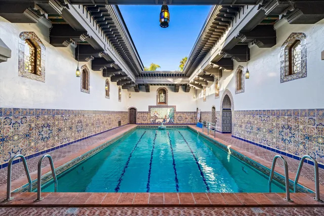 a view of a yard with an outdoor seating