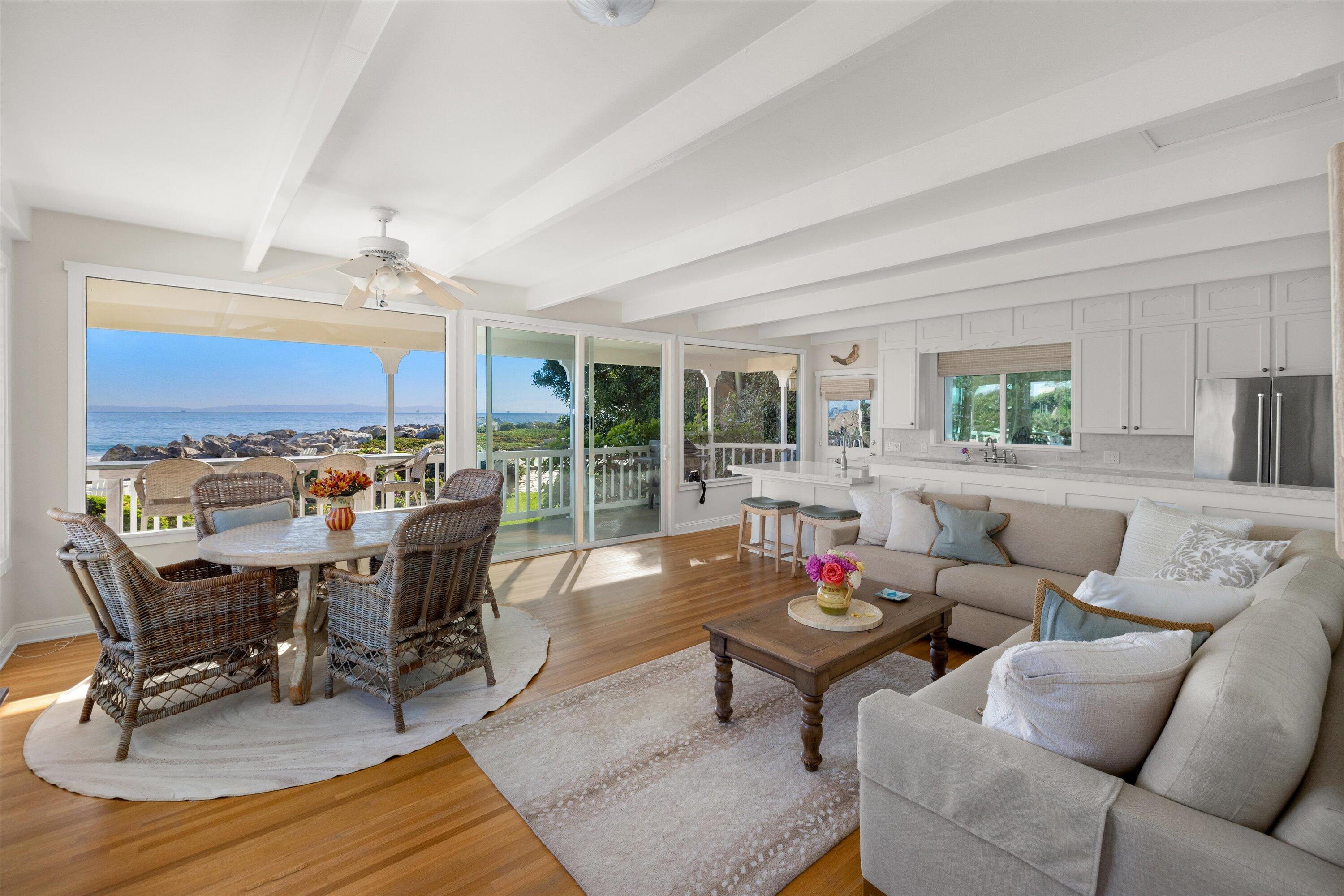 867 Sand Point Road Carpinteria, CA 93013 - Photo 6 of 23 a living room with furniture kitchen view and a large window