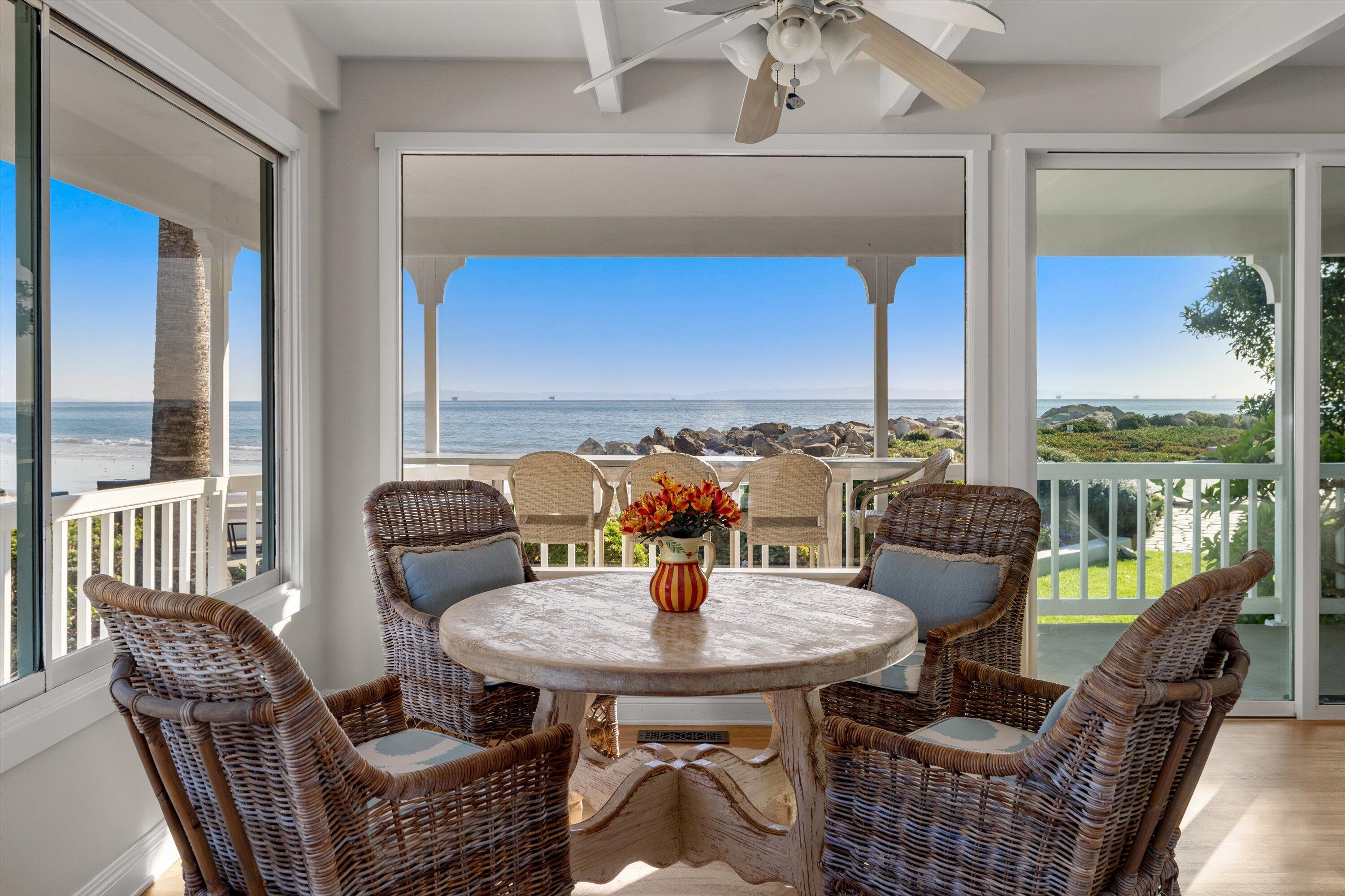 867 Sand Point Road Carpinteria, CA 93013 - Photo 9 of 23 a view of a dining room with furniture window and outside view
