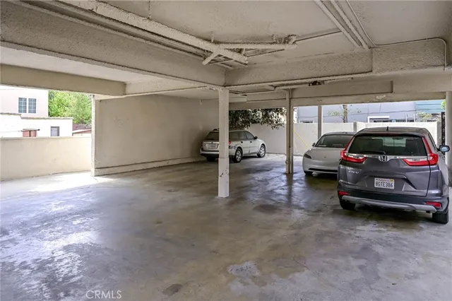 a view of garage with car parked