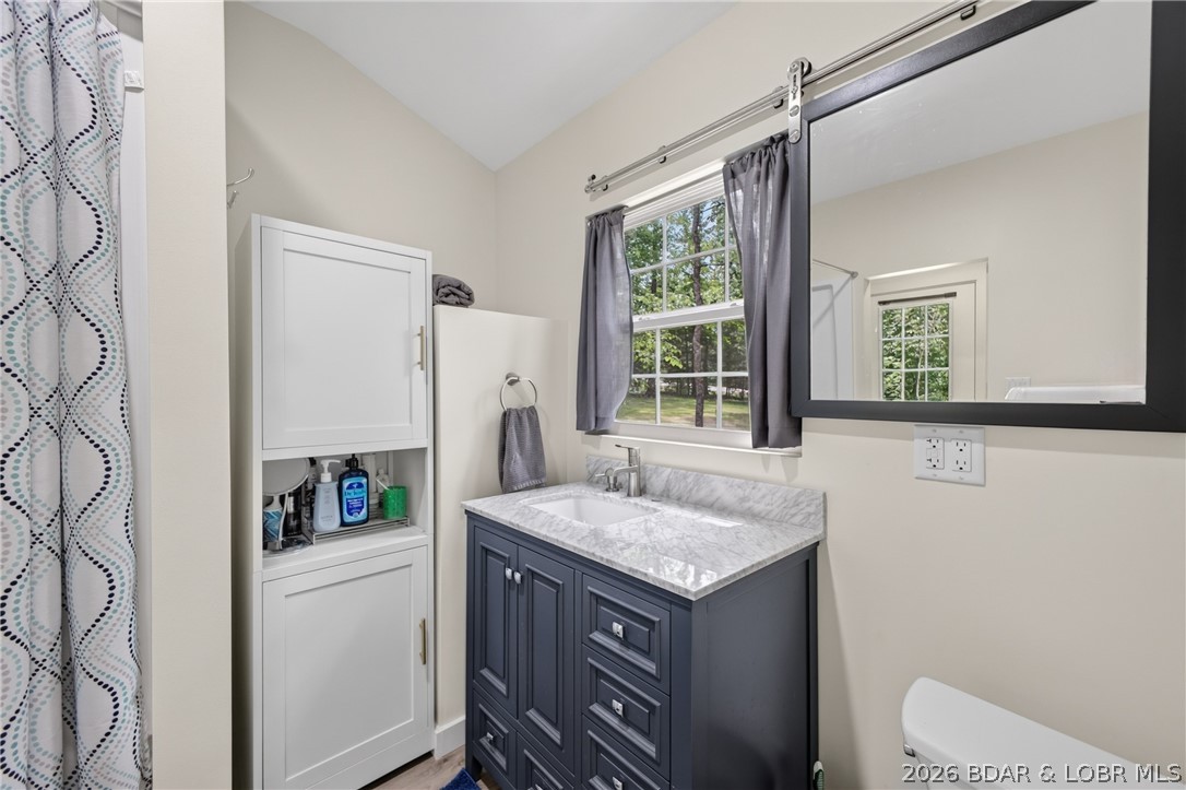 25145 State Route West Barnett, MO 65011 - Photo 16 of 58 Integrated storage, sliding mirror