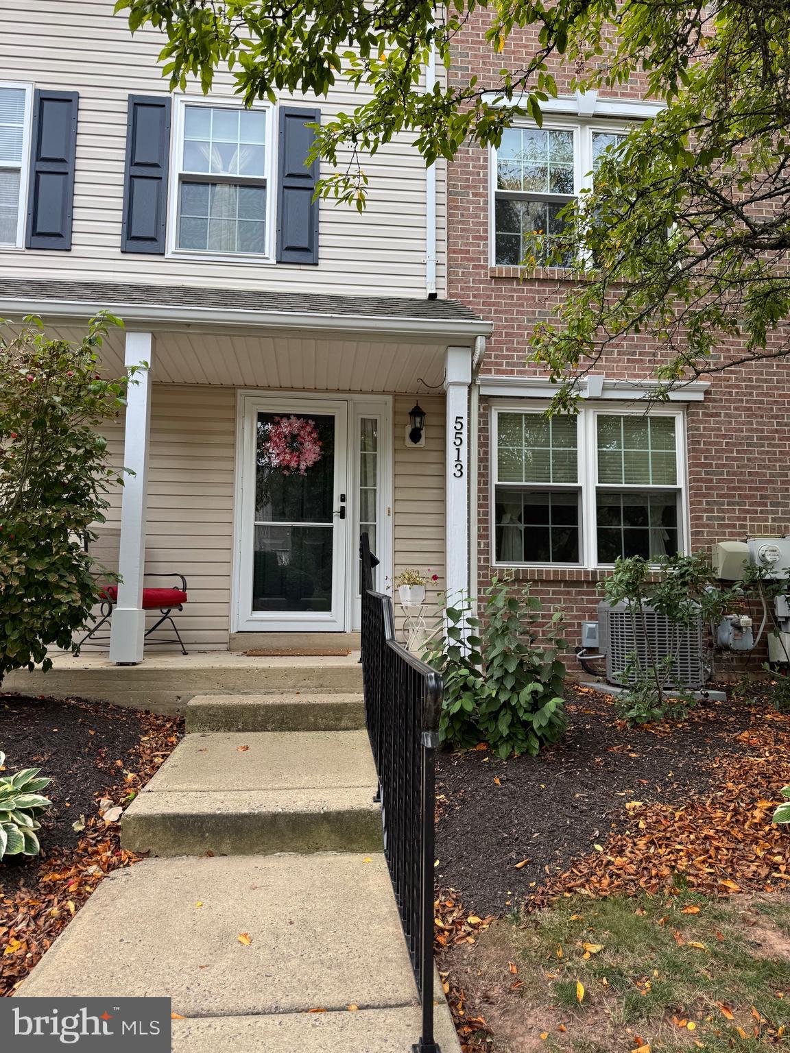 5513 Rinker Circle Doylestown, PA 18902 - Photo 2 of 22 a front view of a house with garden