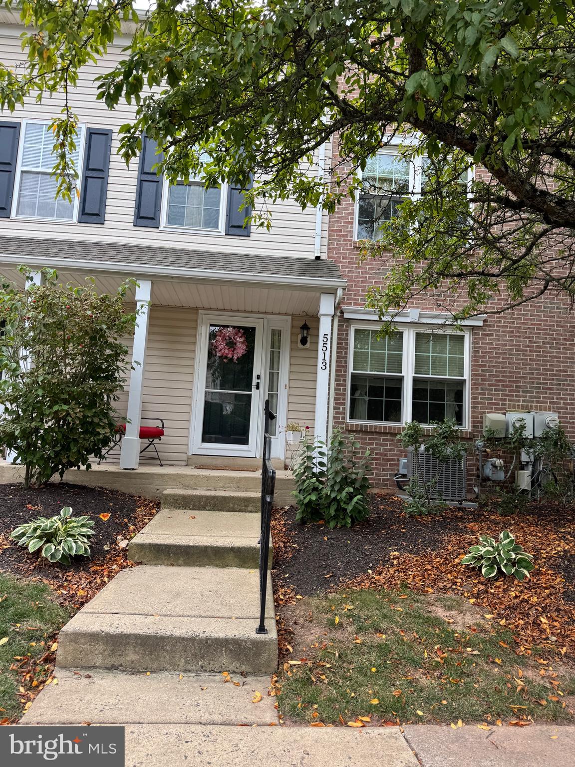 5513 Rinker Circle Doylestown, PA 18902 - Photo 3 of 22 a front view of a house with garden