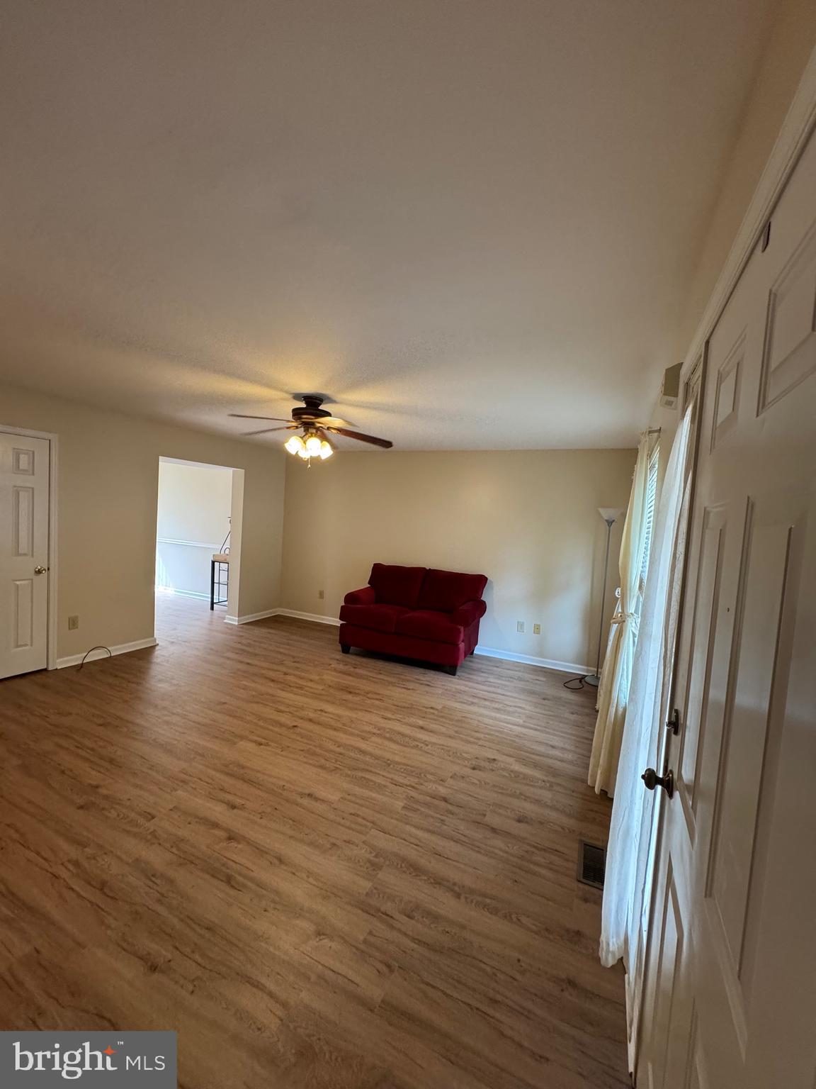 5513 Rinker Circle Doylestown, PA 18902 - Photo 4 of 22 a view of empty room with wooden floor