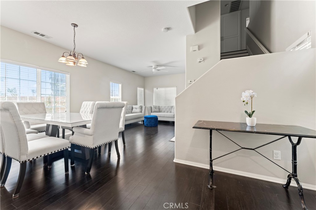 1339 Castledale Street Riverside, CA 92501 - Photo 4 of 27 a view of a dining room with furniture and wooden floor