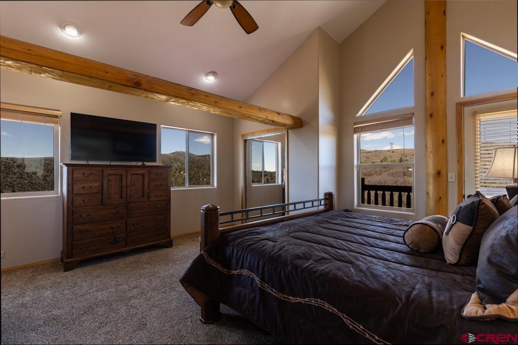 1737 Roberts Ridge Drive Hesperus, CO 81326 - Photo 13 of 34 a bedroom with a bed and furniture