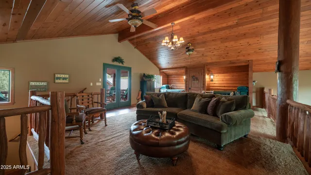 a clock on a wall next to a window