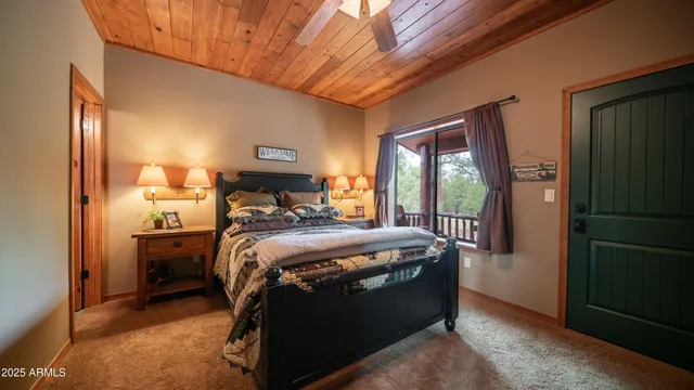 a bathroom with a granite countertop sink a mirror and shower