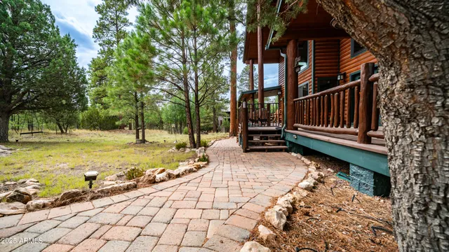 a view of house with deck