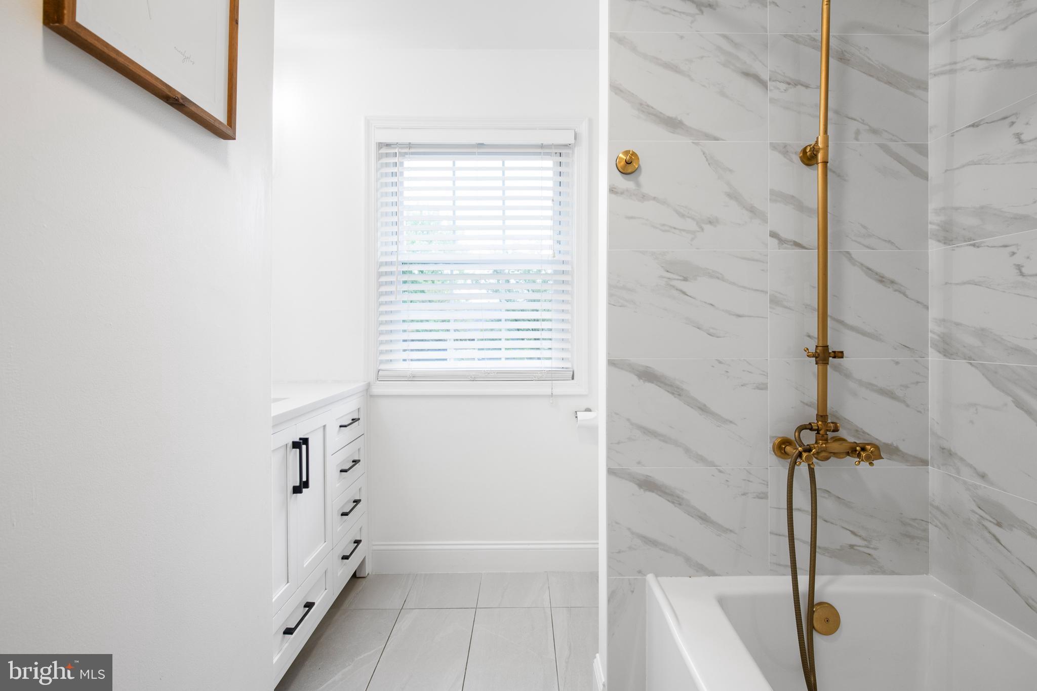 1014 Jeffrey Lane Lititz, PA 17543 - Photo 18 of 41 a bathroom with a bathtub and shower
