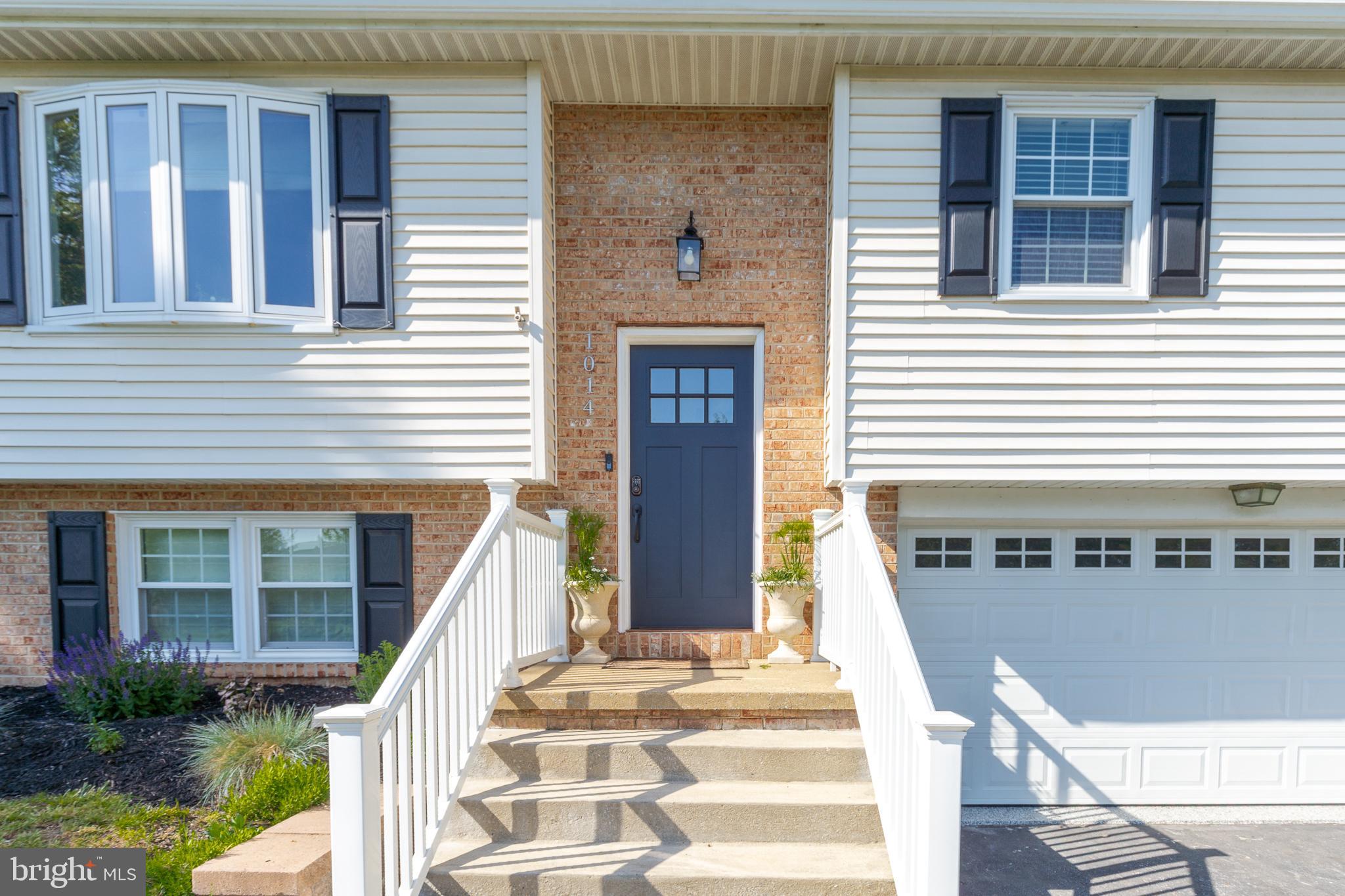 1014 Jeffrey Lane Lititz, PA 17543 - Photo 4 of 41 a front view of a house with a yard