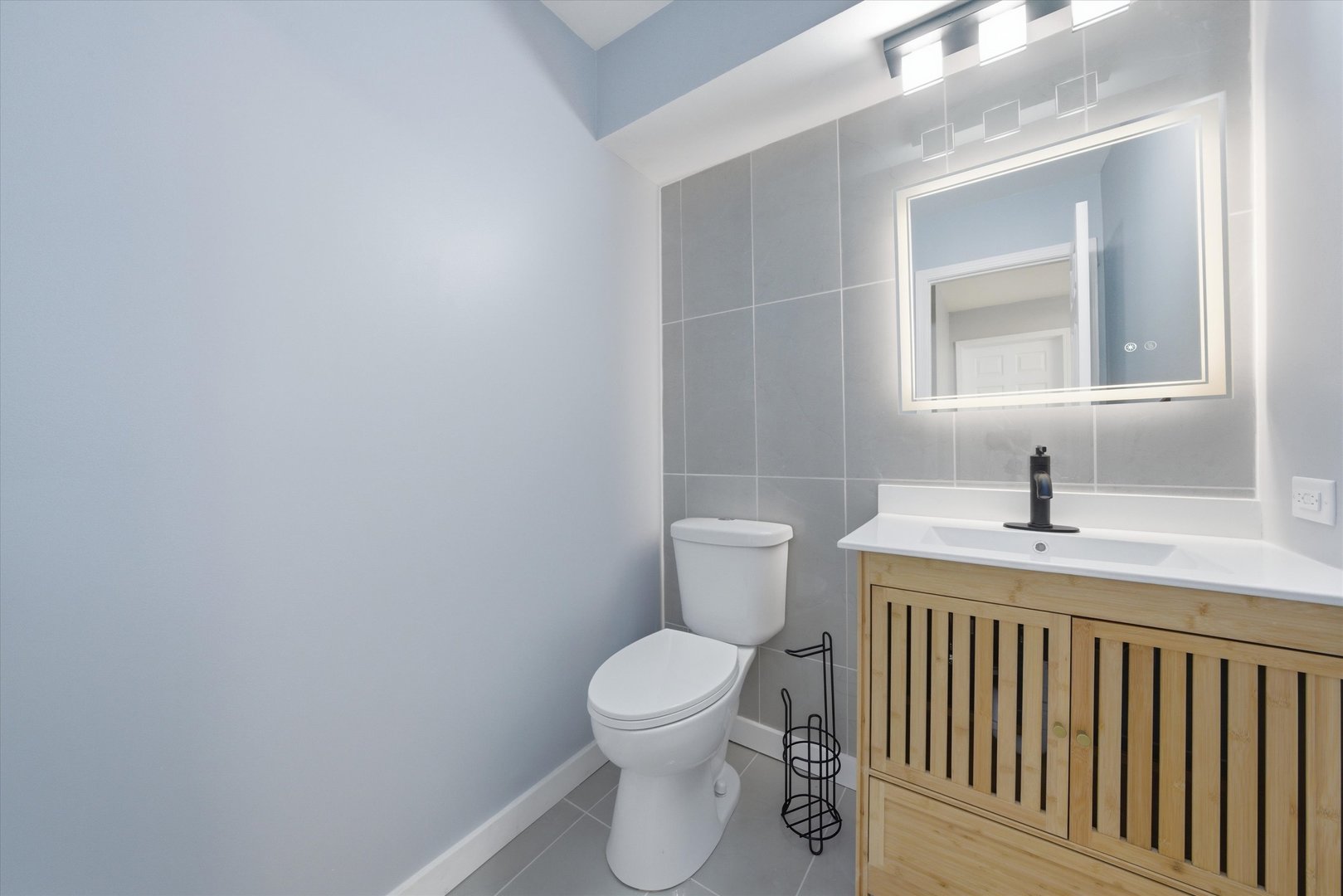 518 Apollo Drive Joliet, IL 60435 - Photo 13 of 25 a bathroom with a toilet a sink and mirror