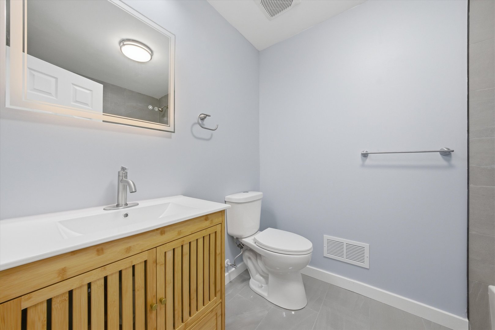 518 Apollo Drive Joliet, IL 60435 - Photo 14 of 25 a bathroom with a sink a toilet and a mirror