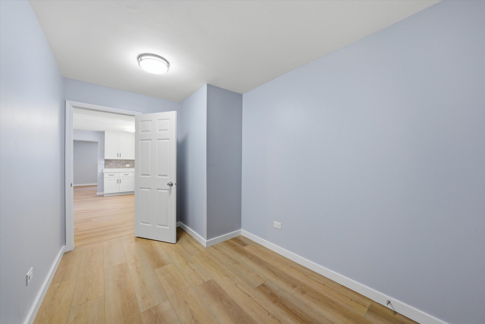 518 Apollo Drive Joliet, IL 60435 - Photo 18 of 25 a view of empty room with wooden floor