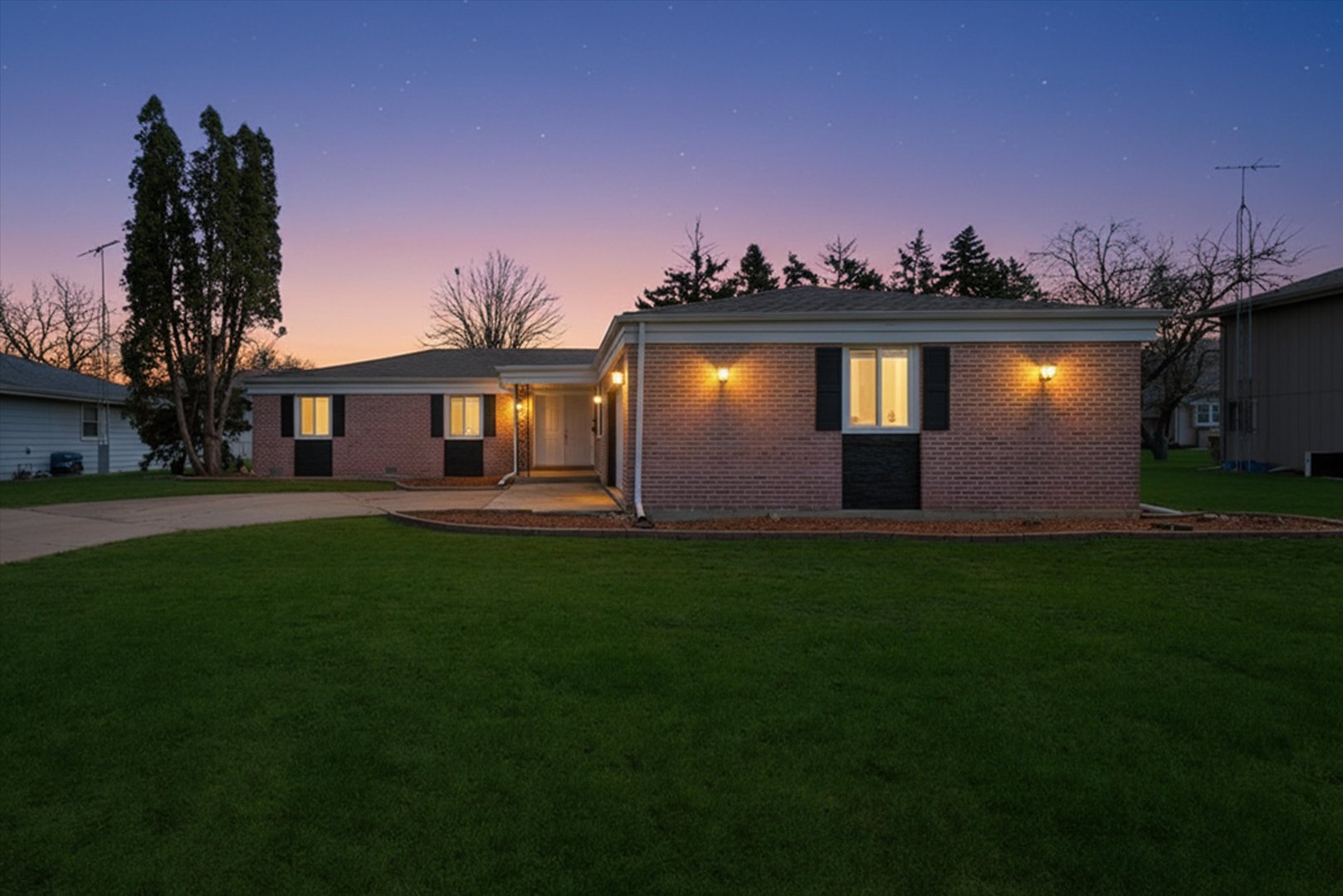 518 Apollo Drive Joliet, IL 60435 - Photo 2 of 25 a front view of a house with a garden and yard