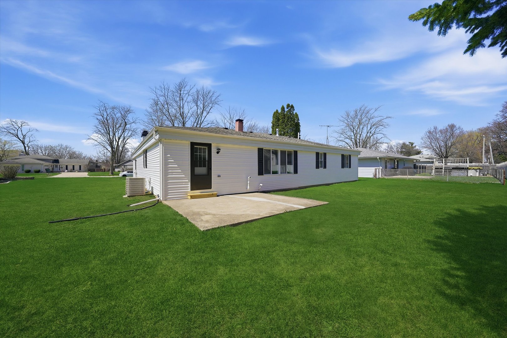 518 Apollo Drive Joliet, IL 60435 - Photo 24 of 25 a view of a house with a yard and sitting area